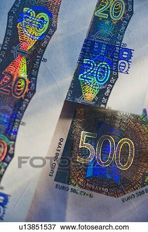 Stock Photo - Close up of euro note holograph. Fotosearch