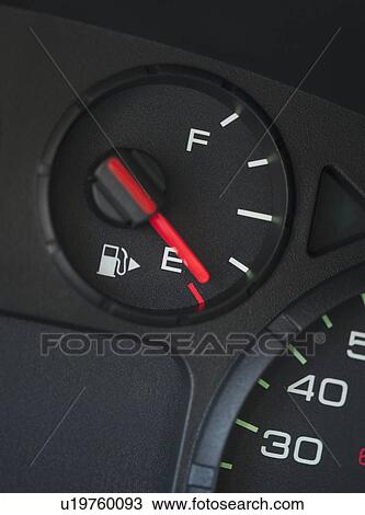 Stock Image - Close up of fuel gauge. Fotosearch