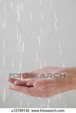 Close up of hand holding electric plug View Large Photo Image Stock Image - Close up of hand holding electric plug. Fotosearch
