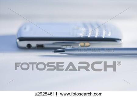 Close up of pen and electronic organizer View Large Photo Image Stock Image - Close up of pen and electronic organizer. Fotosearch
