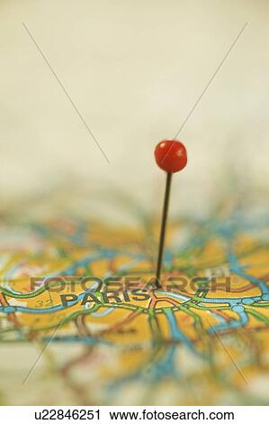 Stock Image - Close up of pin on map location. Fotosearch