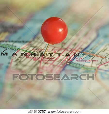 Stock Photo - Close up of pin on map location. Fotosearch