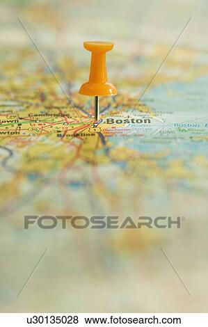 Stock Photo - Close up of pin on map location. Fotosearch