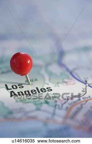 Stock Photography - Close up of pin on map location. Fotosearch