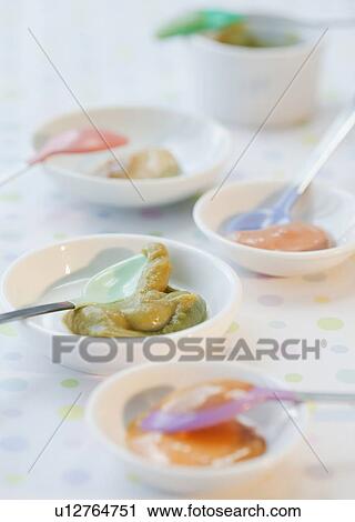 Stock Image - Close up of roll of cash. Fotosearch