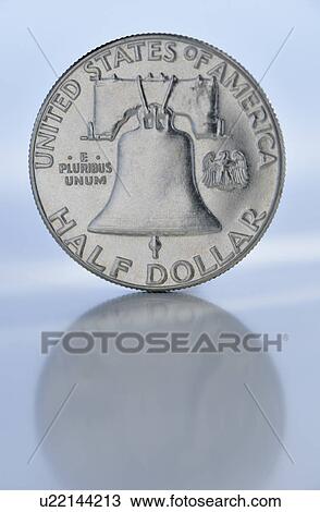 Stock Image - Close up of silver coin. Fotosearch