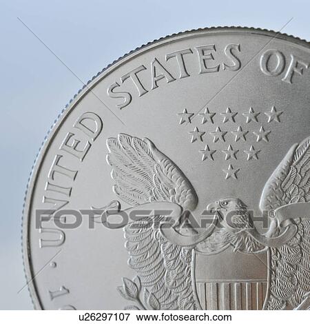 Stock Photo - Close up of silver coin. Fotosearch