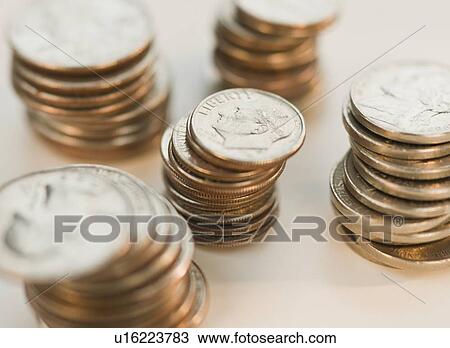 Stock Image - Close up of stacks of coins. Fotosearch
