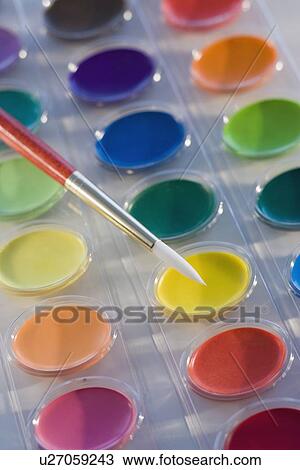 Stock Image - Close up of watercolor paints. Fotosearch