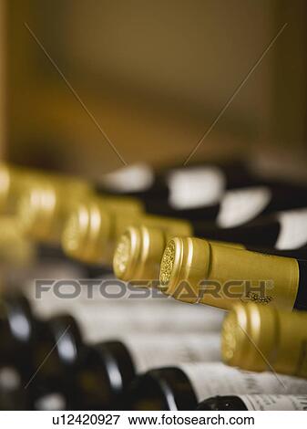 Close up of wine bottle tops View Large Photo Image Stock Photo - Close up of wine bottle tops. Fotosearch