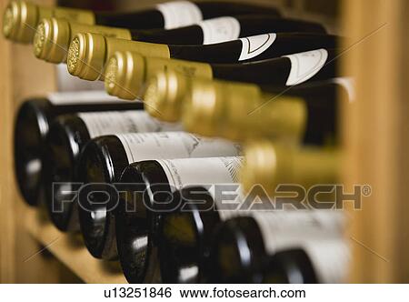Close up of wine bottles View Large Photo Image Stock Photograph - Close up of wine bottles. Fotosearch
