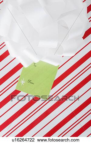 Close up of wrapped Christmas gift View Large Photo Image Stock Image - Close up of wrapped Christmas gift. Fotosearch