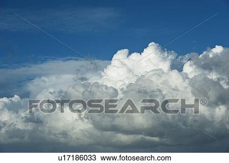 Clouds and blue sky View Large Photo Image Stock Image - Clouds and blue sky. Fotosearch