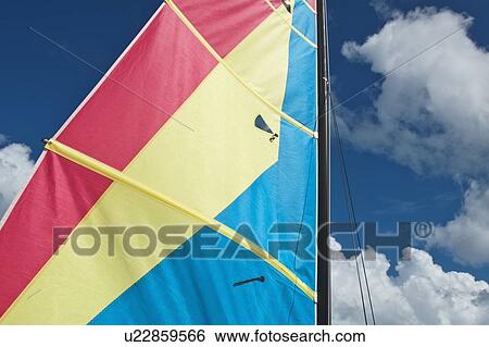 Stock Photograph - Colorful boat sail. Fotosearch