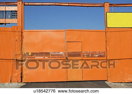 Colorful industrial gate View Large Photo Image Stock Photograph - Colorful industrial gate. Fotosearch