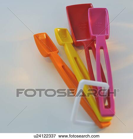 Stock Photo - Colorful measuring spoons. Fotosearch