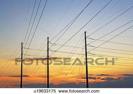 Communication tower and power lines View Large Photo Image Stock Photography - Communication tower and power lines. Fotosearch