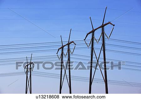 Communication towers and power lines View Large Photo Image Stock Photo - Communication towers and power lines. Fotosearch