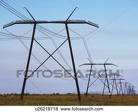 Communication towers and power lines View Large Photo Image Stock Photo - Communication towers and power lines. Fotosearch