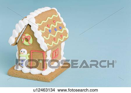 Picture - Decorated gingerbread house. Fotosearch