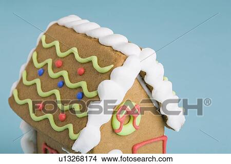 Picture - Decorated gingerbread house. Fotosearch