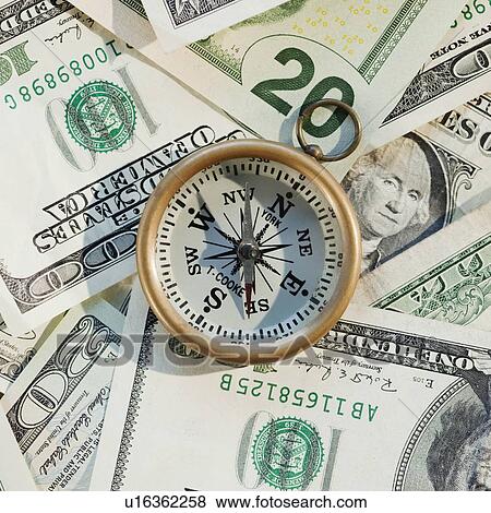 Dice on pile of money View Large Photo Image Stock Photo - Dice on pile of money. Fotosearch