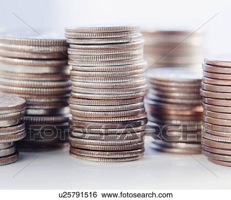 Stock Photograph - Egg carton full of money. Fotosearch