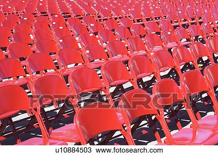 Stock Image - Empty stadium seats. Fotosearch