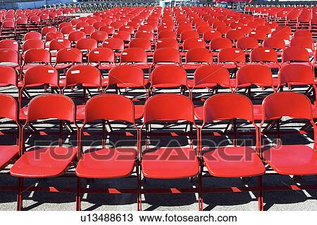 Stock Image - Empty stadium seats. Fotosearch