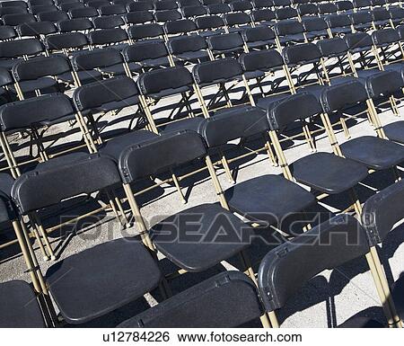 Stock Photograph - Empty stadium seats. Fotosearch