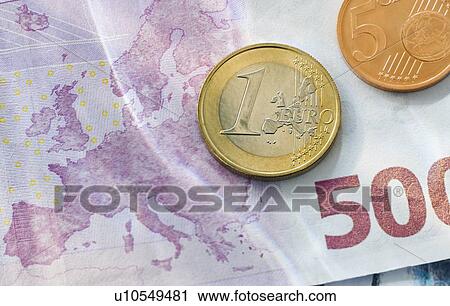 Stock Image - Euro coins and paper currency. Fotosearch