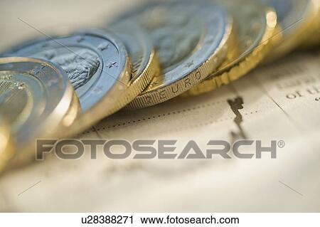 Euro coins on financial graph View Large Photo Image Stock Image - Euro coins on financial graph. Fotosearch