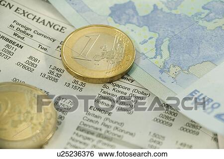 Stock Photograph - Euros and exchange rates. Fotosearch