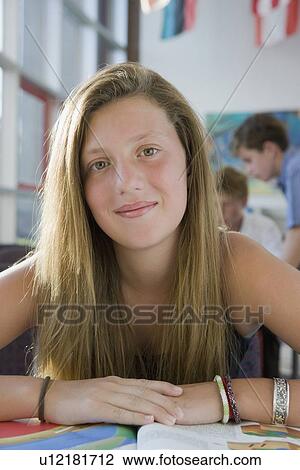Girl posing in library View Large Photo Image Stock Image - Girl posing in library. Fotosearch