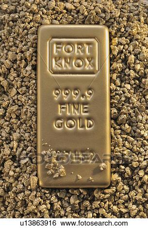 Gold block and nuggets View Large Photo Image Stock Photograph - Gold block and nuggets. Fotosearch