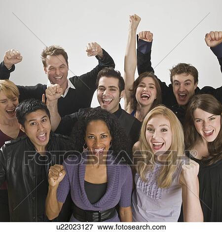 Group of friends cheering View Large Photo Image Stock Photo - Group of friends cheering. Fotosearch