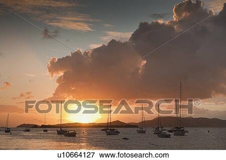 Harbor at sunset View Large Photo Image Stock Photo - Harbor at sunset. Fotosearch