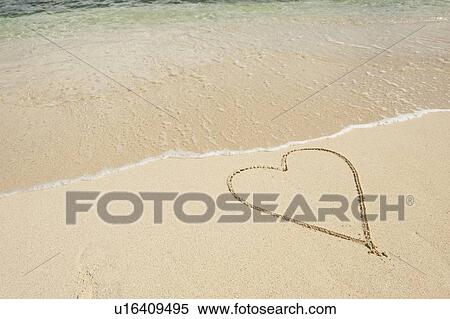 Heart drawn in sand View Large Photo Image Stock Photography - Heart drawn in sand. Fotosearch