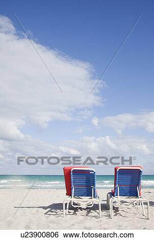 Stock Photograph - Heart shaped cloud over ocean. Fotosearch