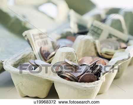 Stock Image - House made of paper money. Fotosearch