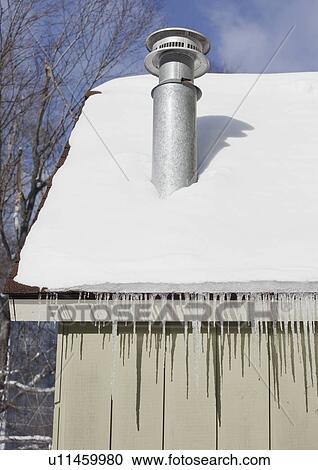 Icicles hanging from roof eaves View Large Photo Image Stock Image - Icicles hanging from roof eaves. Fotosearch