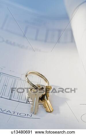 Stock Image - Keys on blueprints. Fotosearch