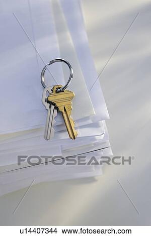 Keys on stack of mail View Large Photo Image Picture - Keys on stack of mail. Fotosearch