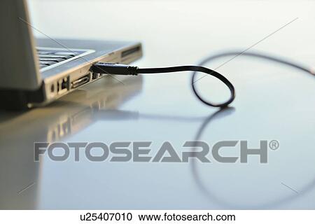 Laptop and usb cord View Large Photo Image Stock Image - Laptop and usb cord. Fotosearch