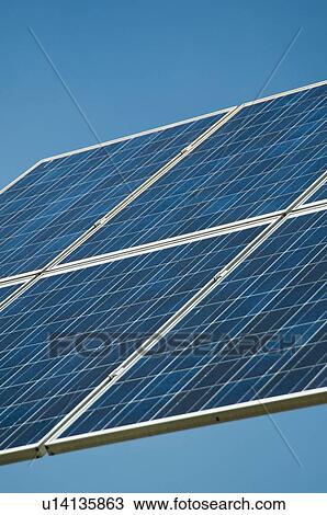Stock Image - Low angle view of solar panel. Fotosearch