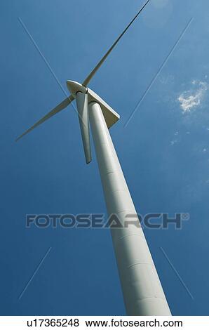 Stock Photo - Low angle view of wind turbine. Fotosearch