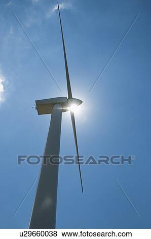 Low angle view of wind turbine View Large Photo Image Stock Photo - Low angle view of wind turbine. Fotosearch