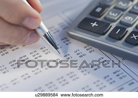 Man calculating numbers View Large Photo Image Picture - Man calculating numbers. Fotosearch