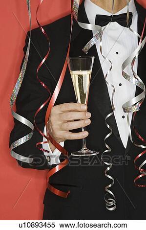 Stock Photography - Man celebrating New Years. Fotosearch