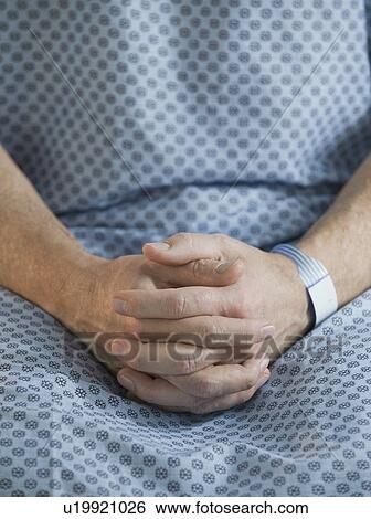 Man in hospital gown View Large Photo Image Stock Photograph - Man in hospital gown. Fotosearch